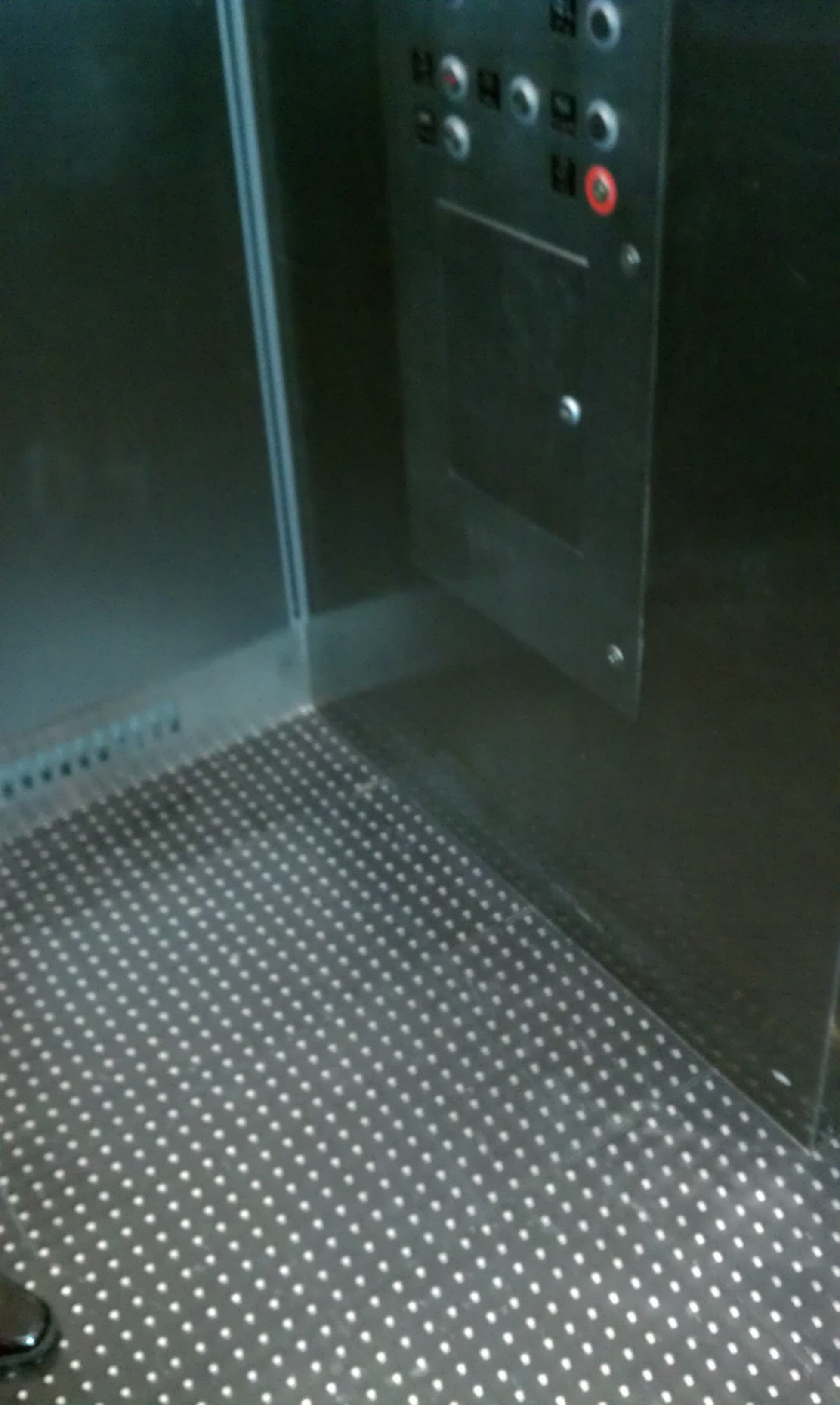 Stainless Steel Studded Rubber Tiles in Elevator